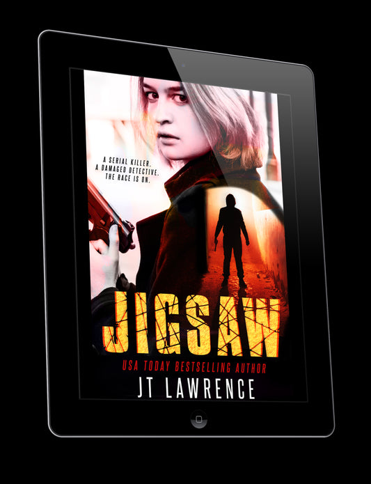A serial killer. A damaged detective. The race is on. Jigsaw, a psychological thriller by USA Today Bestselling Author JT Lawrence